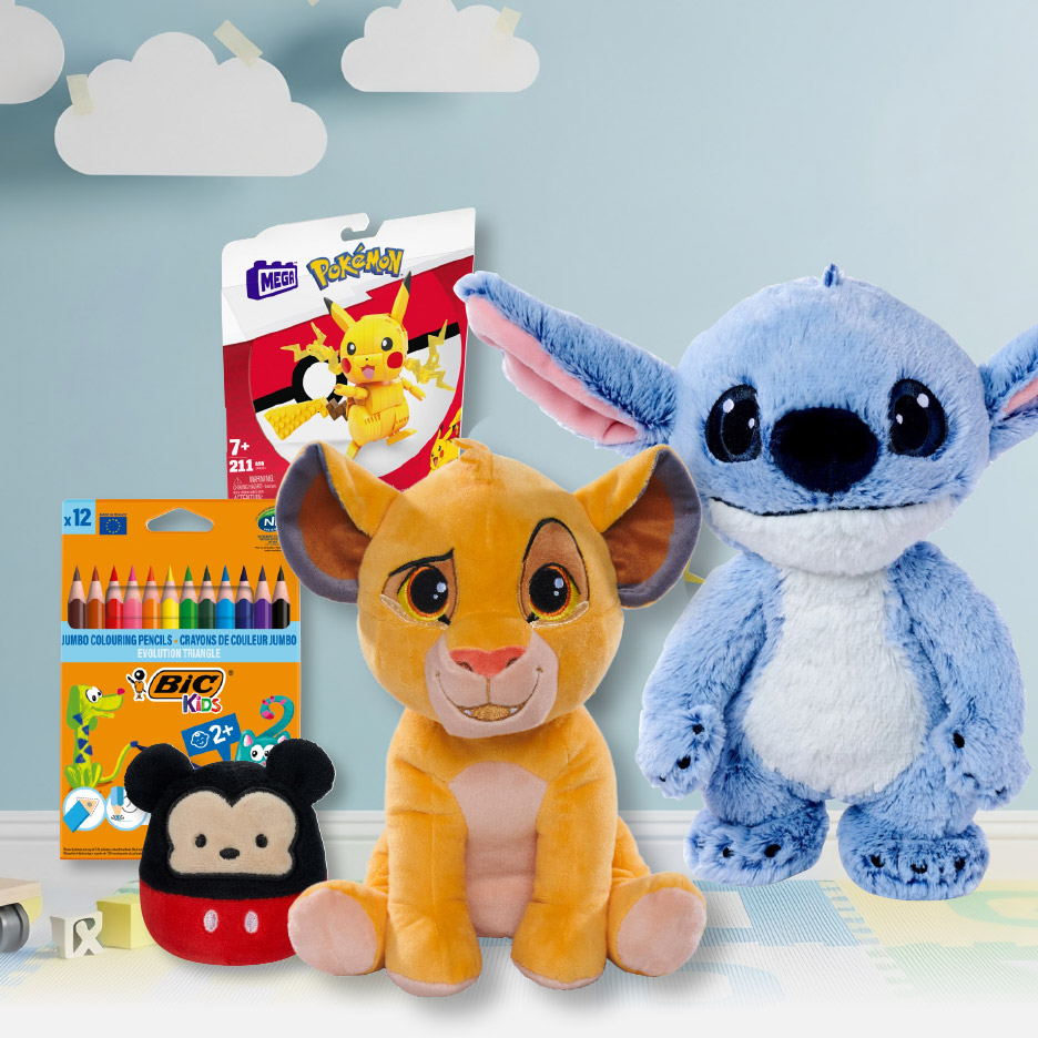 Een assortiment speelgoed en knutselspullen, waaronder knuffels van een leeuwenwelp en een blauw buitenaards wezen, kleurpotloden en een bouwset.